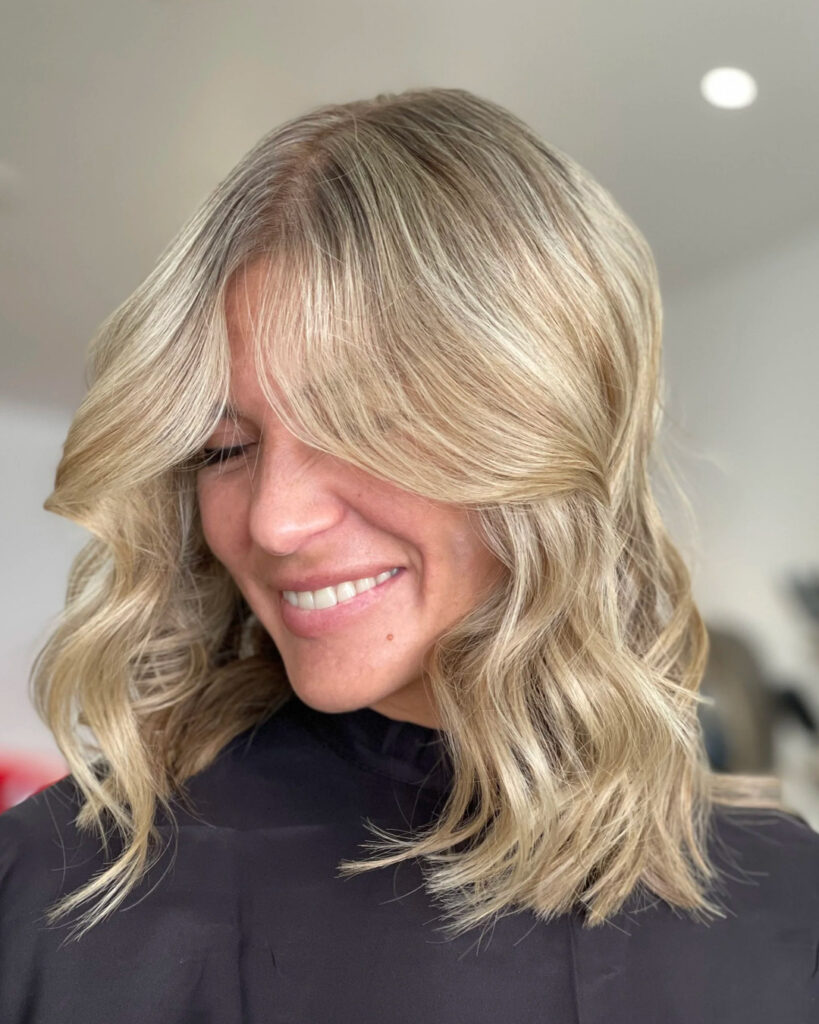 Soft lived-in blonde waves by Brigitte